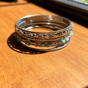 5 silver bracelets one with turquoise. All 5 one price